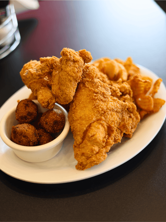 Fried Chicken recipe served on a plate, by Mandez's Seafood Bar & Grill