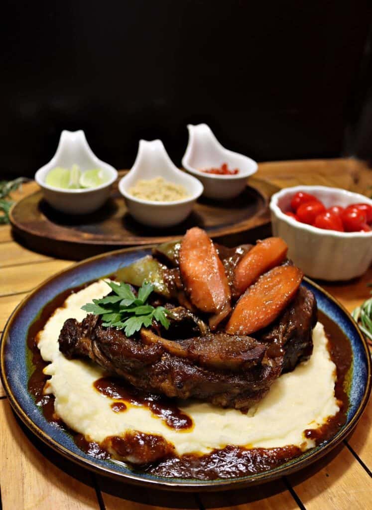 Osso Buco recipe served on a plate, by Boteco Restaurant Osso Buco recipe served on a plate, by Boteco Restaurant