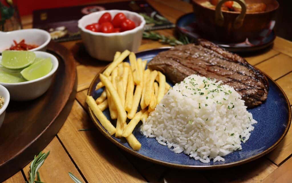 Picanha Tradicional recipe served on a plate, by Boteco Restaurant Picanha Tradicional recipe served on a plate, by Boteco Restaurant
