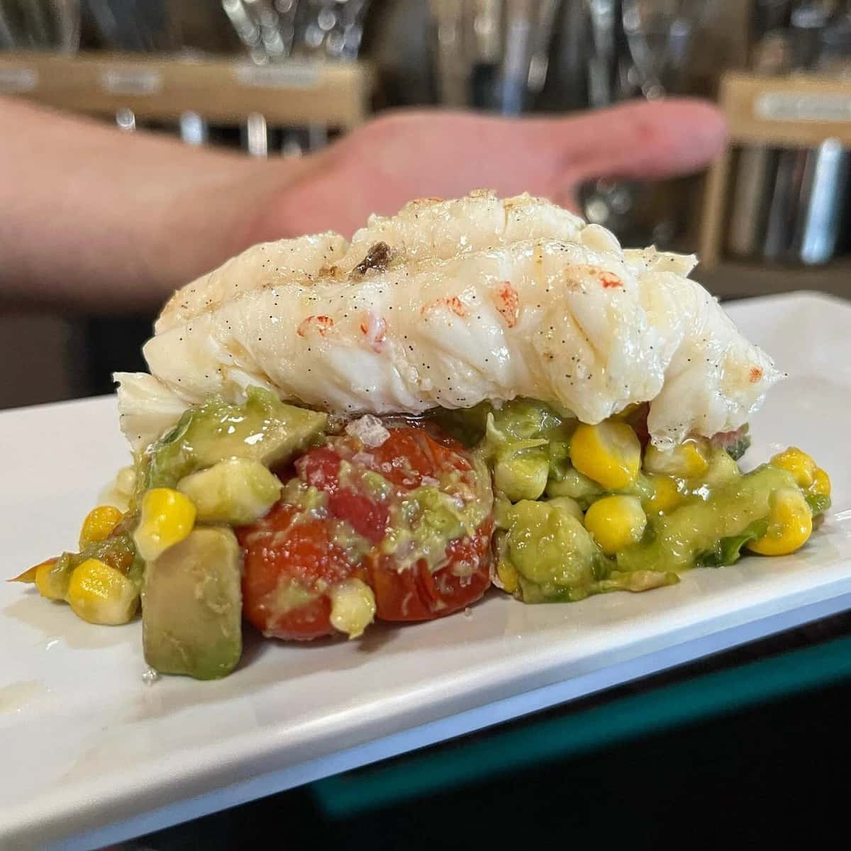 Vanilla Butter Poached Lobster recipe served on a plate, by Borrowed Time Vanilla Butter Poached Lobster recipe served on a plate, by Borrowed Time