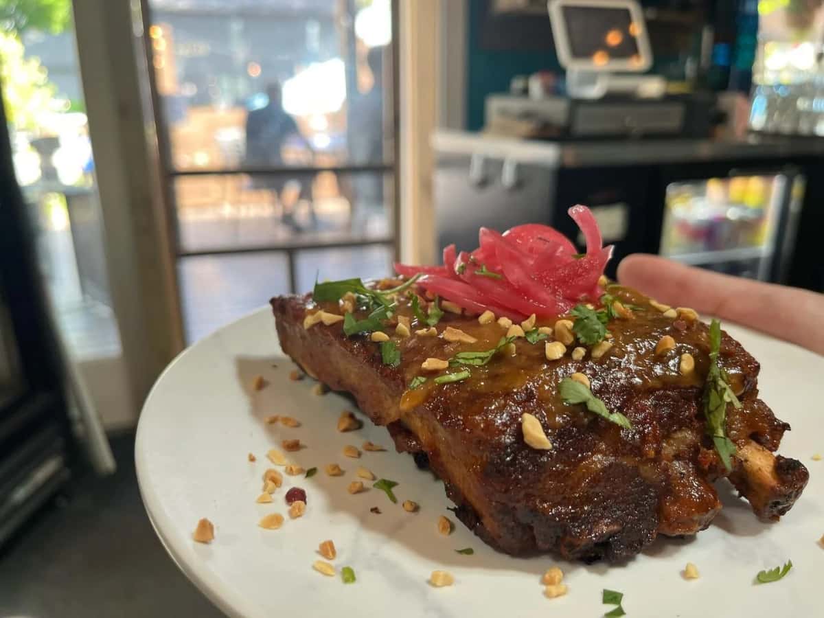 Pork Rib Special recipe served on a plate, by Borrowed Time Pork Rib Special recipe served on a plate, by Borrowed Time