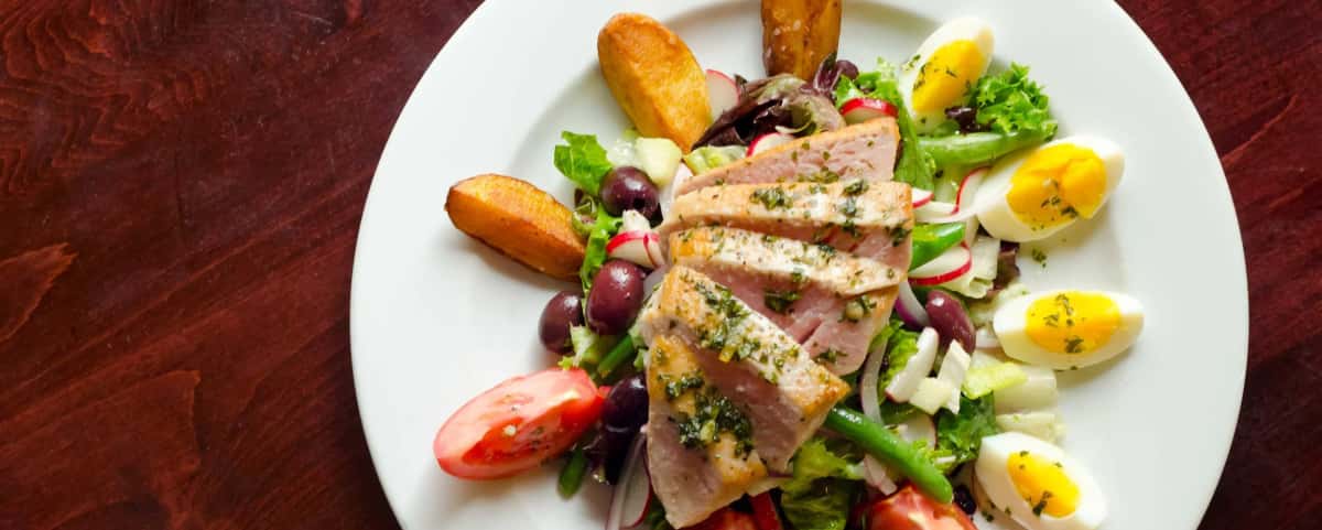 Tuna Niçoise recipe served on a plate, by Django Tuna Niçoise recipe served on a plate, by Django